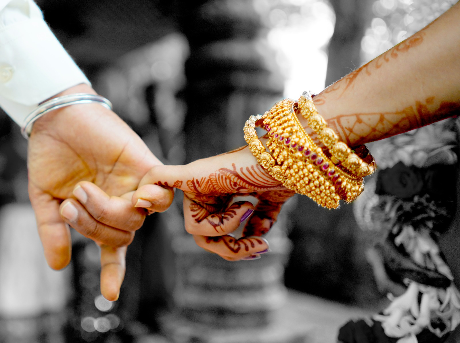 Wedding guests celebrating sangeet at a luxury resort under string lights